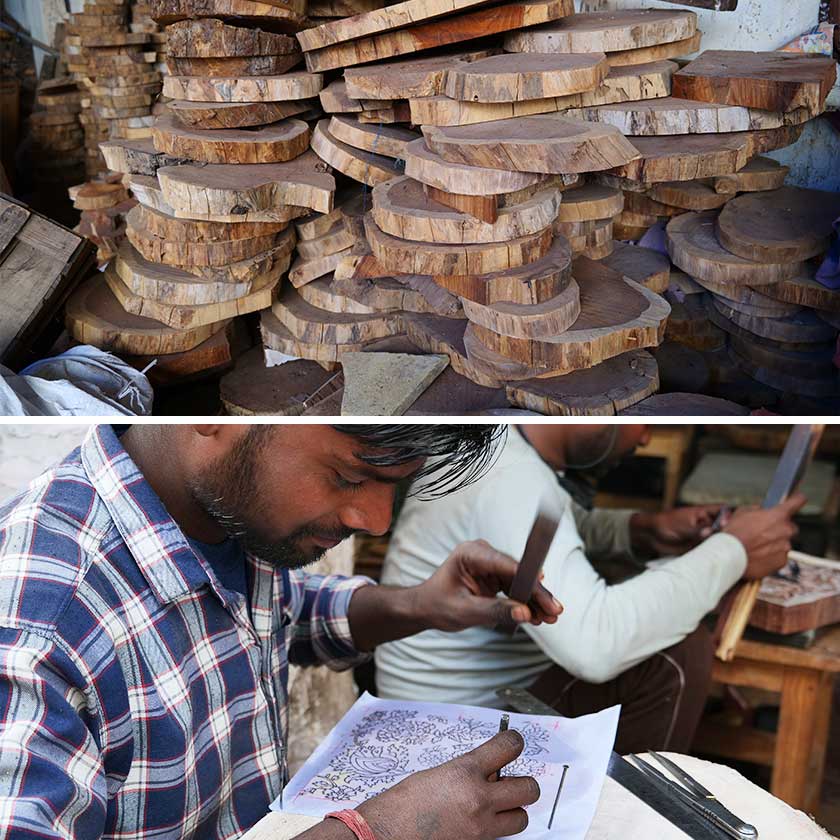 Pile of rosewood slices ready to be carved and a man tracing a design onto one block of wood.