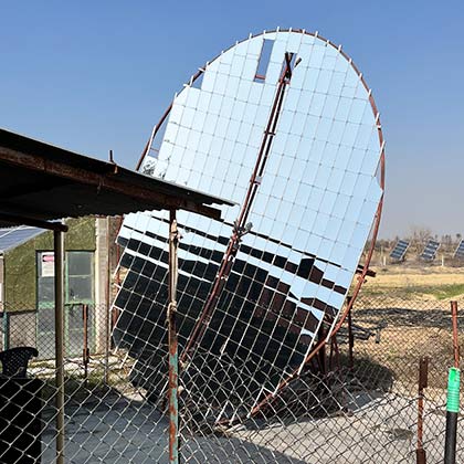 Single solar panel outisde an outdoor kitchen.