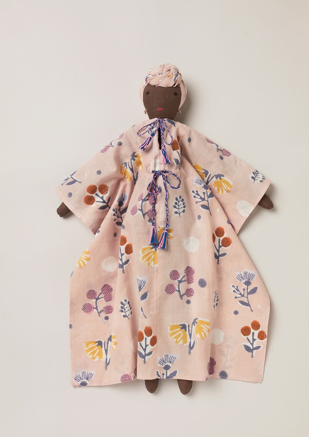 Handmade upcycled black rag doll with long block printed kaftan.