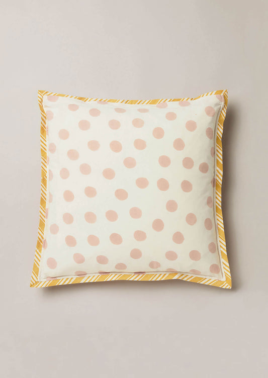 Reverse of block printed cushion with pale pink polka dots on white background and contrast yellow stripe edging.