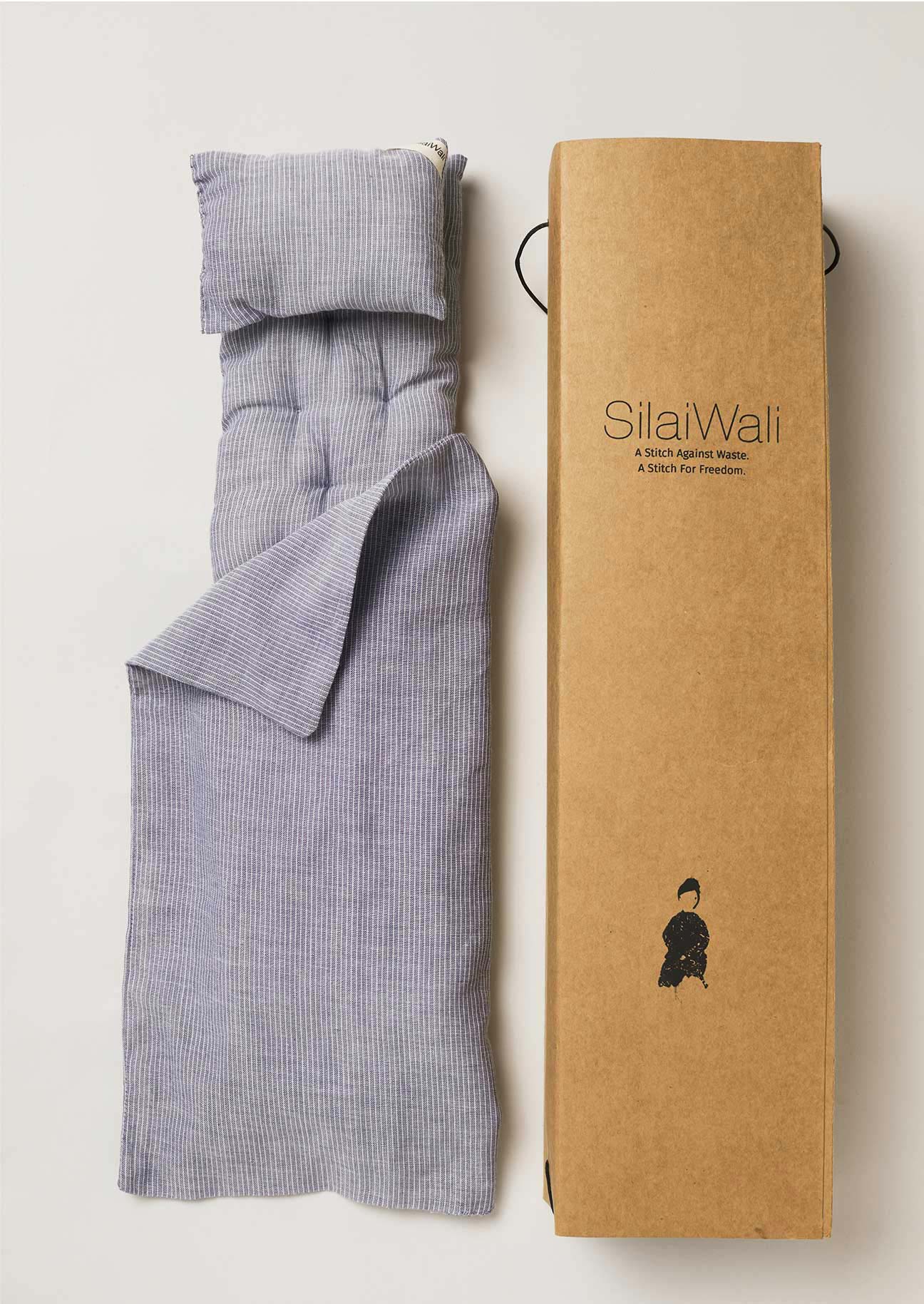 SilaiWali studio recycled cardboard box and bedlinen for doll storage.