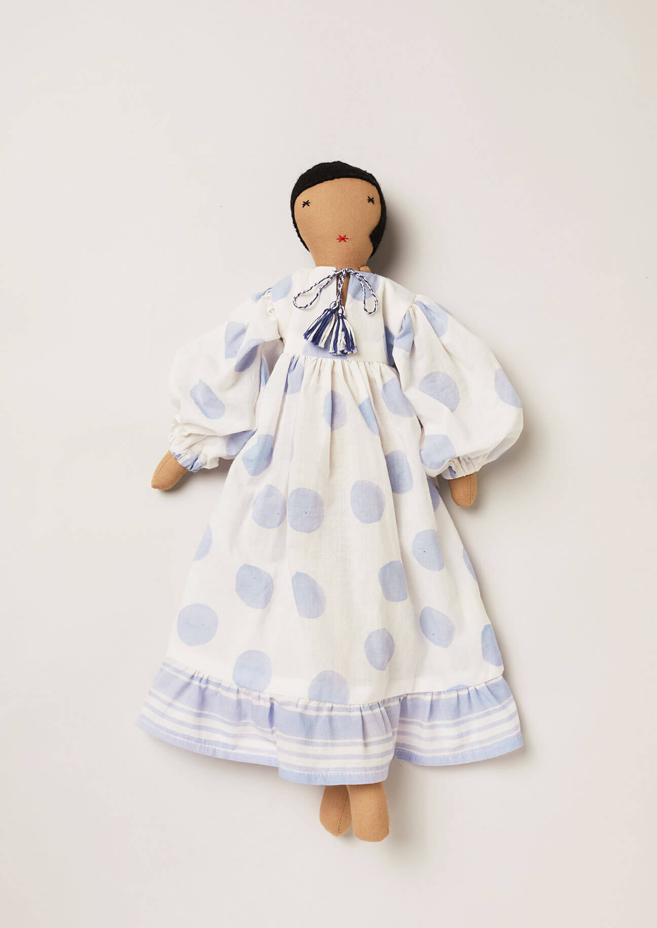 Upcycled rag doll with blue and white dot block printed dress
