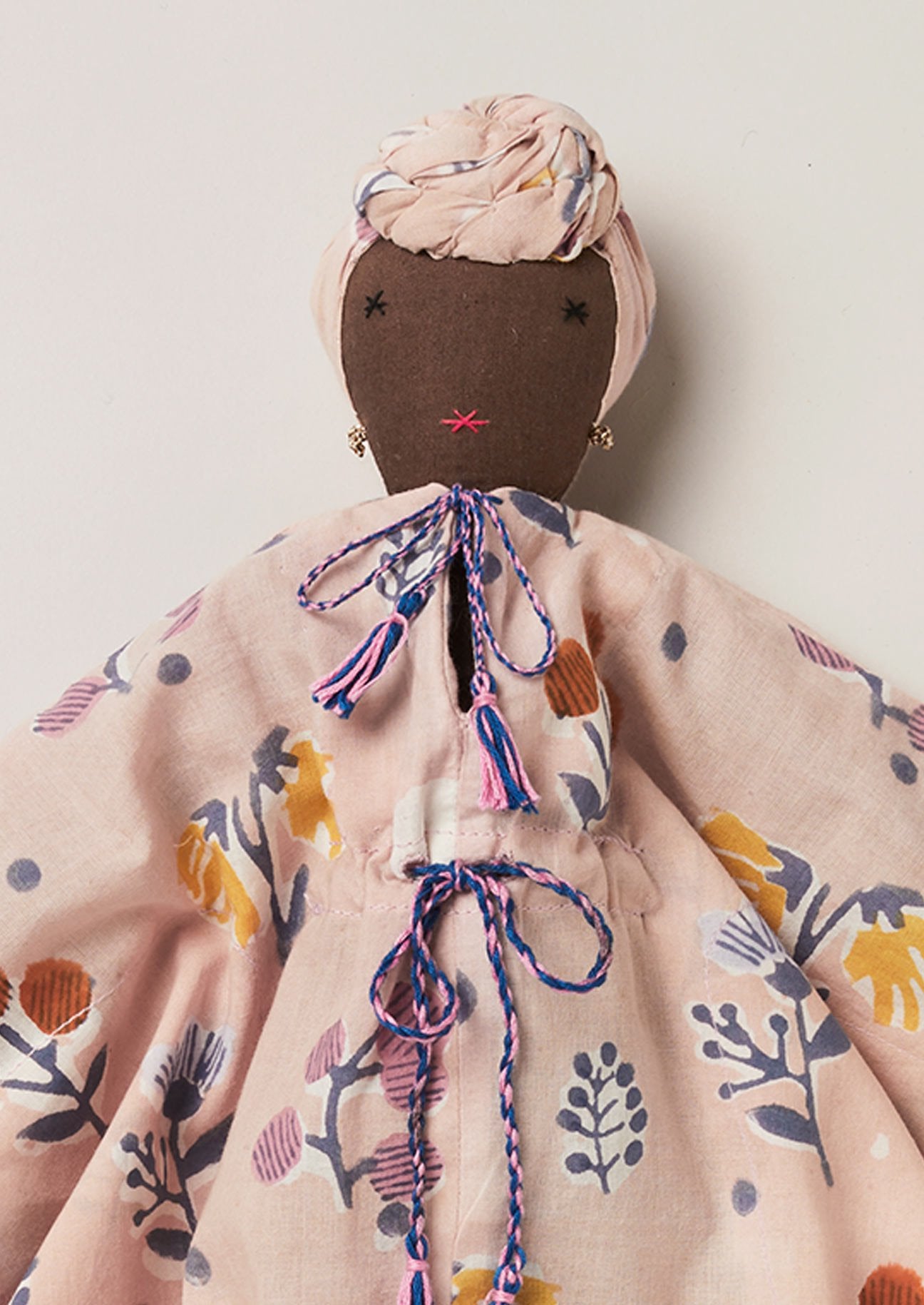 Recycled black rag doll with block printed kaftan and gold earrings